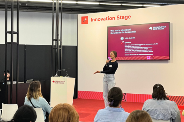 A woman on Innovation Stage during a speech.