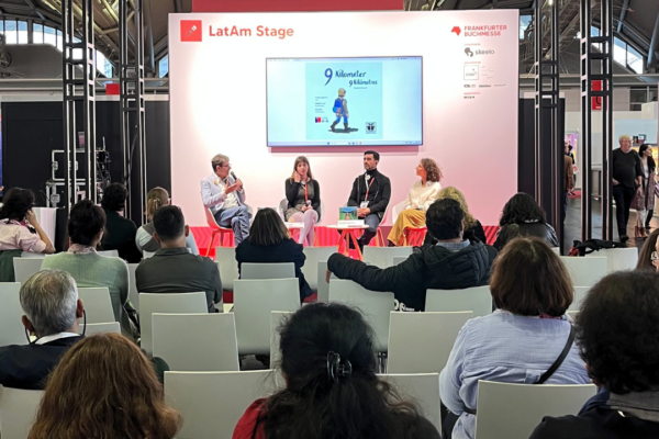 Four people sitting on the LatAm stage have a talk.
