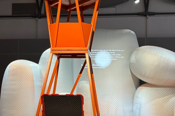 An orange lighthouse as a decoration element of the Czech pavillion at Frankfurt Book Fair.